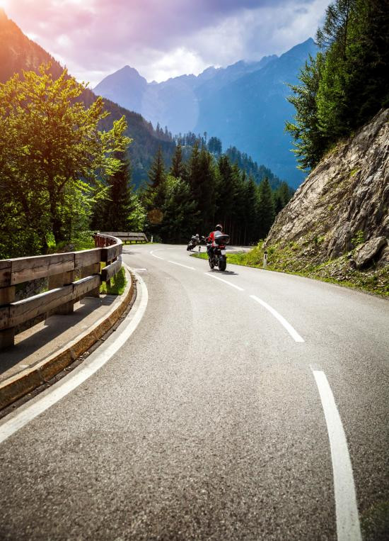 Motorcycle riders on mountain road