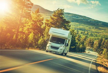 RV driving through mountains