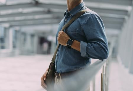 Man with travel bag at airport